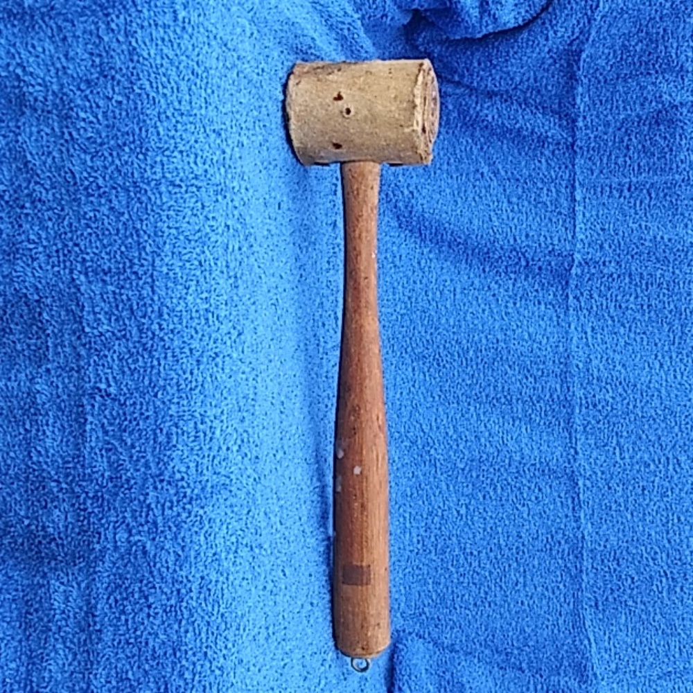 Leather rolled rawhide mallet with wood handle